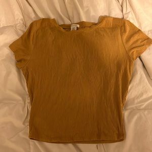 short sleeve tight fitting dark yellow crop top